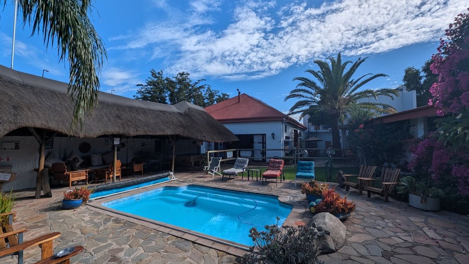 The garden and pool area at Chameleon Backpackers & Guesthouse, Windhoek