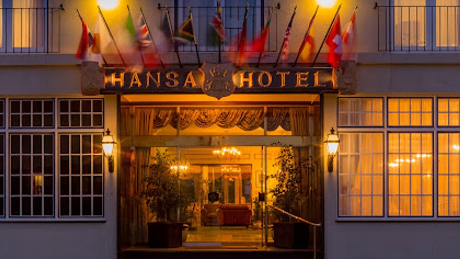 The historic entrance of the Hansa Hotel, Swakopmund, lit at dusk