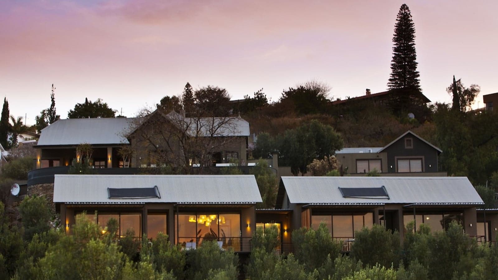 Suites overlooking Windhoek at dusk from The Olive Exclusive